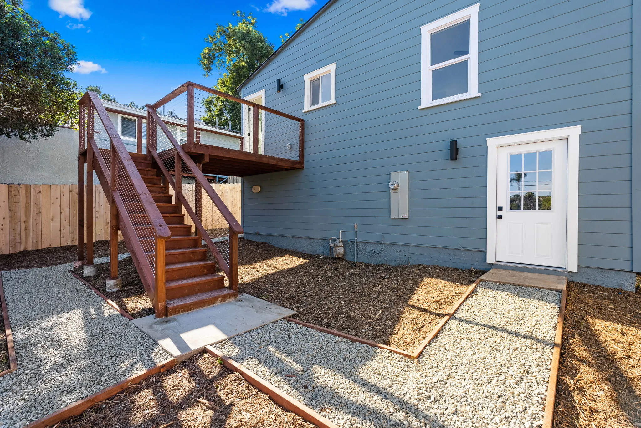 Exterior stairs and siding work on a permitted renovation in La Mesa, California